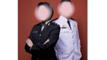 Briptu Suci Darma dan Damsir Khalik Masri ASN Pemkab Ogan Komering Ilir.