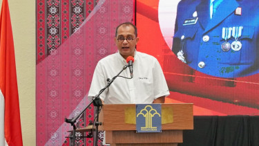 Wamenkumham Edward O.S Hiariej.