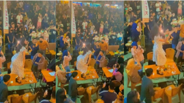 Viral seorang wanita joget di atas meja