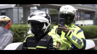 Sistem tilang menggunakan ponsel