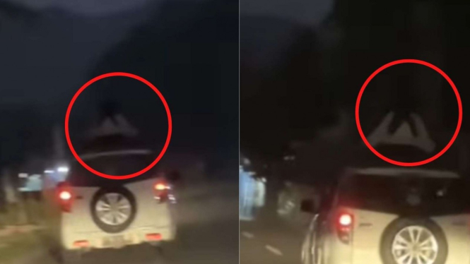 Viral sosok di atas mobil