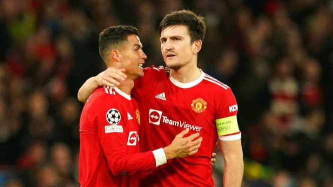Pemain Manchester United Cristiano Ronaldo dan Harry Maguire