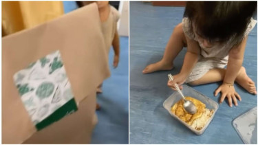 seorang ibu membungkus masakannya dengan paper bag agar anak mau makan