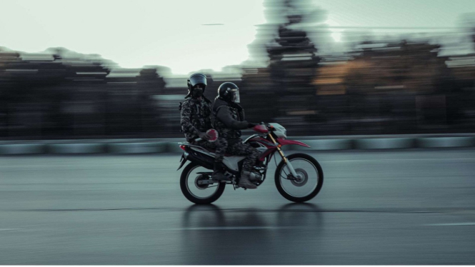 Ilustrasi pengendara sepeda motor
