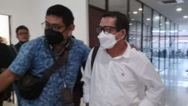 Mantan dekan Fakultas Ilmu Sosial dan Ilmu Politik (FISIP) Universitas Riau (Unr