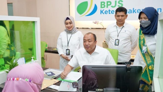 Ketua Dewan Pengawas BPJAMSOSTEK, Muhammad Zuhri, di tengah kegiatan Harpelnas