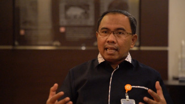 Direktur Bisnis Jasa Keuangan Pos Indonesia, Haris