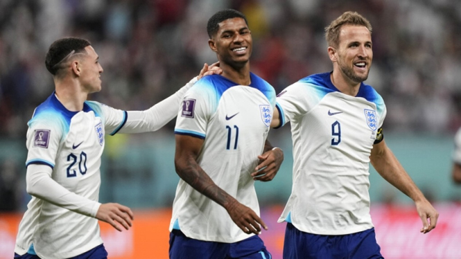 Selebrasi Marcus Rashford saat cetak gol di laga Inggris vs Iran