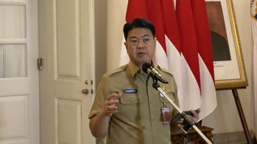 Kepala Dinas Tenaga Kerja Pemprov DKI Jakarta Andriansyah saat umumkan UMP DKI