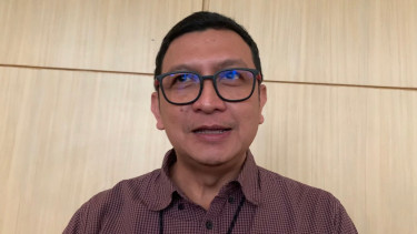 Vice President Marketing Communications Telkom Indonesia, E. Kurniawan.