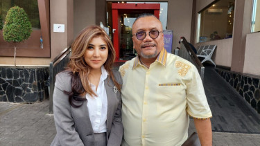  Togar Situmorang dan Viany Zaelany 