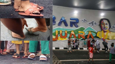 Sandal warga nempel di aspal