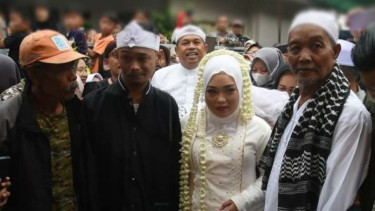 Pernikahan pengemudi ojek online yang merupakan penyandang disabilitas di Padalarang, Kabupaten Bandung Barat, Jawa Barat, Sabtu, 21 Januari 2023.