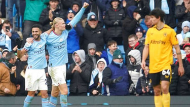 Erling Haaland merayakan gol