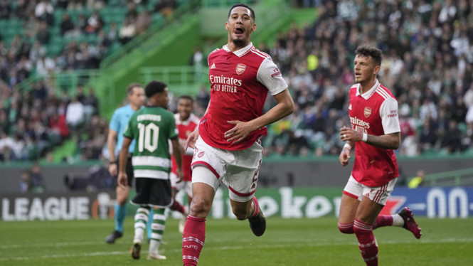 Selebrasi William Saliba usai bobol gawang Sporting Lisbon