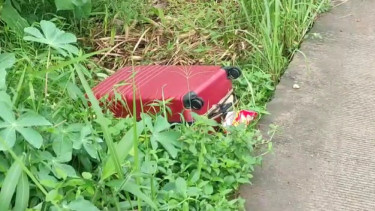 Penemuan koper berwarna merah berisi mayat wanita yang dimutilasi
