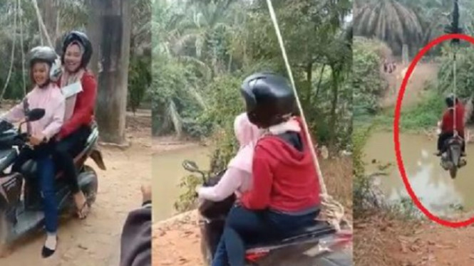 Aksi pemotor sebrangi sungai