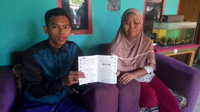 Fahmi Husaeni suami dari Anggi Anggraeni bersama keluarganya