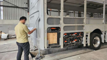 Perakitan Bus listrik.