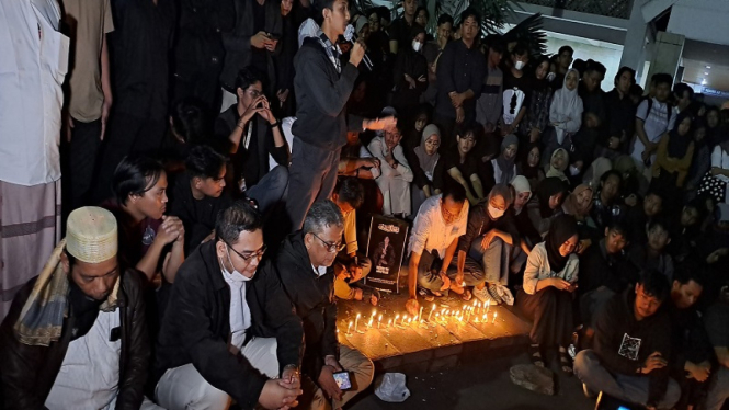 Mahasiswa UMY menggelar doa bersama untuk korban mutilasi Redho Tri Agustian.