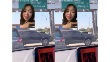 Mobil Fortuner hitam putar balik di tol