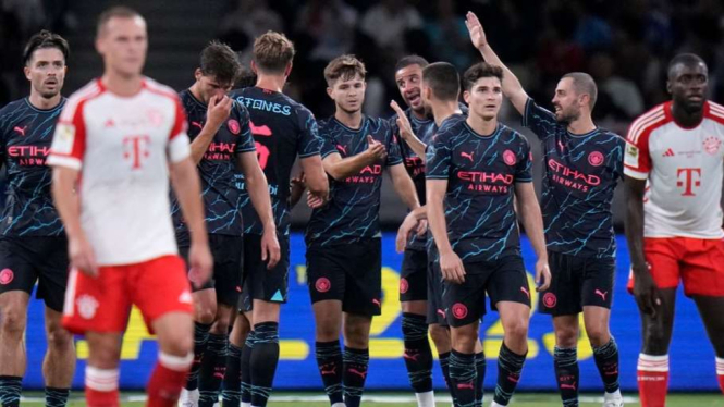 Pemain Manchester City rayakan gol ke gawang Bayern Munich