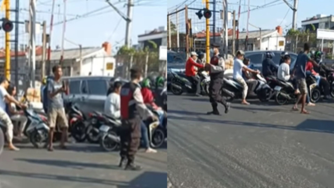 Momen polisi atur lalu lintas