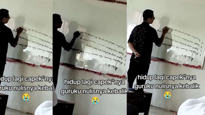 Guru Menulis dengan Huruf Terbalik di Papan Tulis