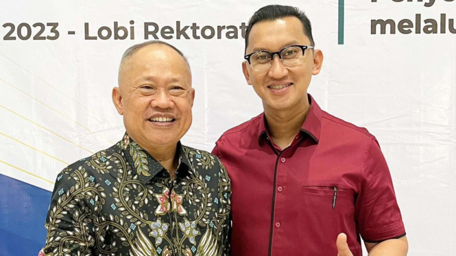 AKBP Andi Sinjaya (baju merah)