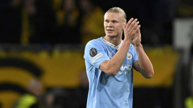 Pemain Manchester City Erling Haaland rayakan gol