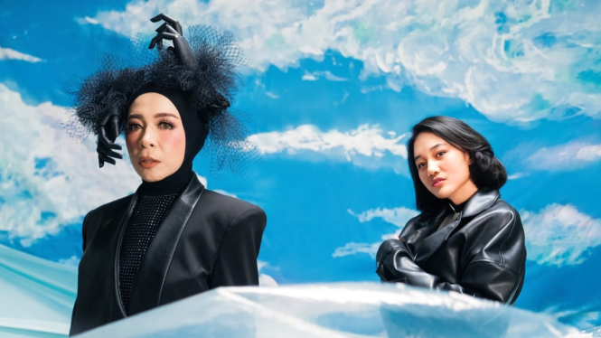 Melly Goeslaw dan Nike Ardila