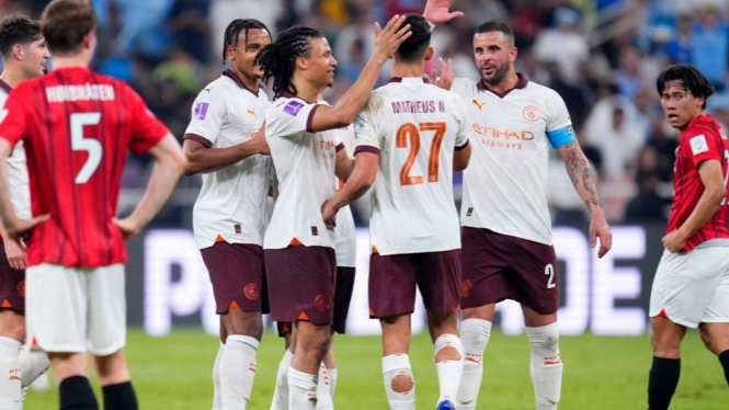 Pemain Manchester City rayakan gol