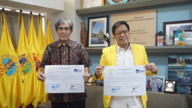 Direktur Eksekutif NETGRIT Hadar Nafis Gumay dan Ketua ILUNI UI Didit Ratam 