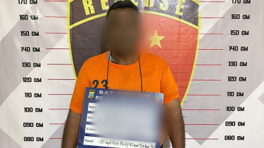 Pelaku BP saat diamankan oleh petugas kepolisian.(istimewa/VIVA)