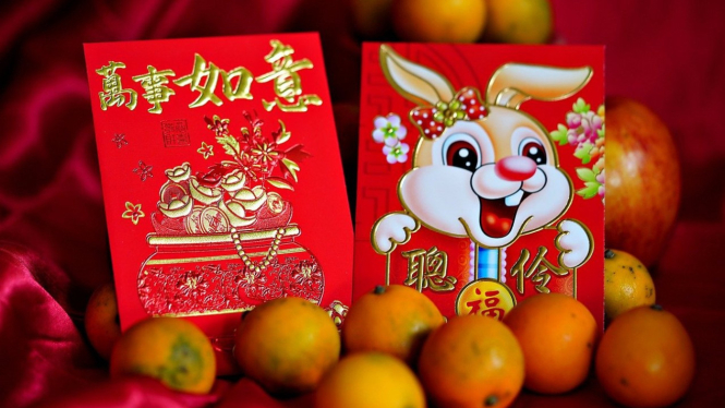 Ilustrasi jeruk mandarin di momen Imlek