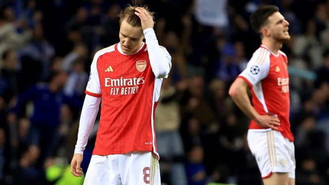 Pemain Arsenal, Martin Odegaard dan Declan Rice usai ditekuk FC Porto