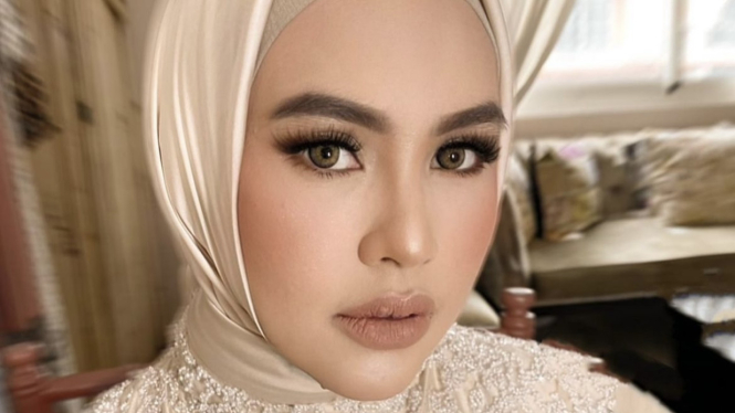 Kartika Putri.