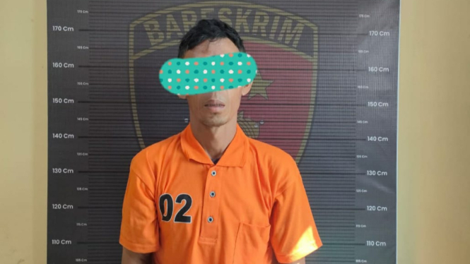 MPS ayah bejat perkosa putri kandungnya saat diamankan Polres Taput.(dok Polres Taput)