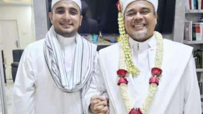 Habib Rizieq (kanan)