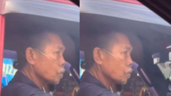 Sopir angkot pakai selang di hidung