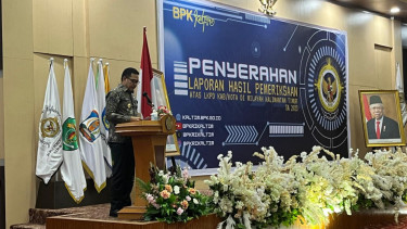 Walikota Samarinda saat meroasting 9 Kepala Daerah di kaltim pada acara penyerahan laporan dari BPK RI Perwakilan Kaltim