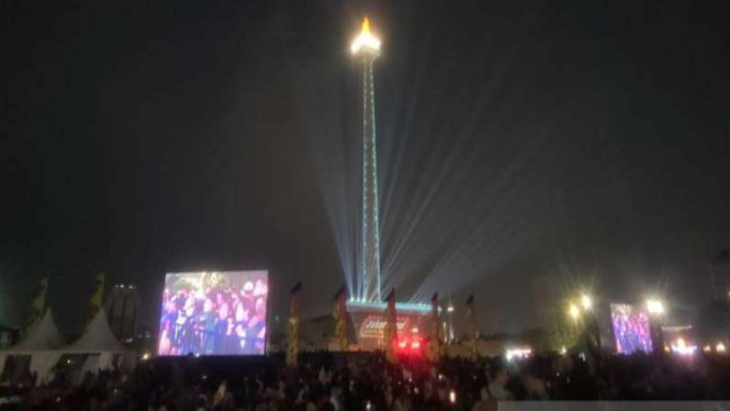 Suasana perayaan HUT DKI Jakarta ke-497 di kawasan Monas, Jakarta Pusat.