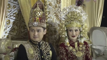 Rizki Natakusumah dan Beby Tsabina