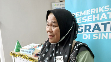 Sari (53), salah satu warga Tangsel yang memanfaatkan program CKG di Puskesmas Ciater, Tangsel