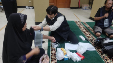 Dinkes kota tangerang lakukam skrining kesehatan pada korban banjir