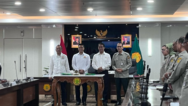 Ketua Umum Kamar Dagang dan Industri (Kadin) Indonesia Anindya Bakrie  dan Menteri Pertanian (Mentan) Andi Amran Sulaiman 