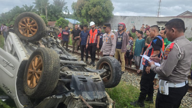 Kecelakaan maut antara mobil dengan kereta api di Kabupaten Asahan, Minggu, 23 Maret 2025..
