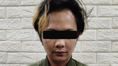 Pelaku yang menodong penjaga warung Madura di Cempaka Putih.