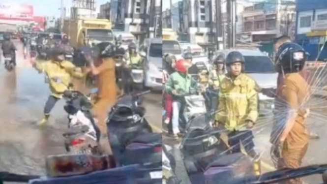 Dua Pria Diduga ASN dan Damkar Baku Hantam di Tengah Jalan Palembang