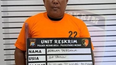 Pelaku Adelan Perdana saat diamankan petugas kepolisian.(istimewa/VIVA)